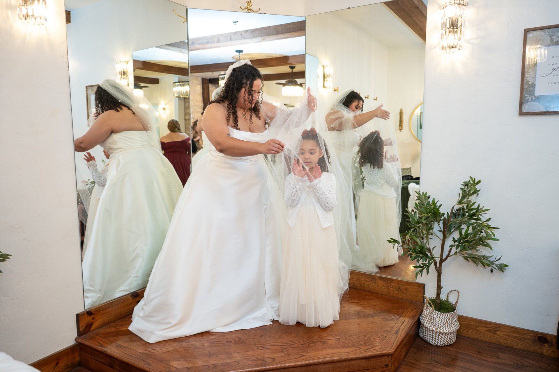 Macee and her bridal party celebrating indoors