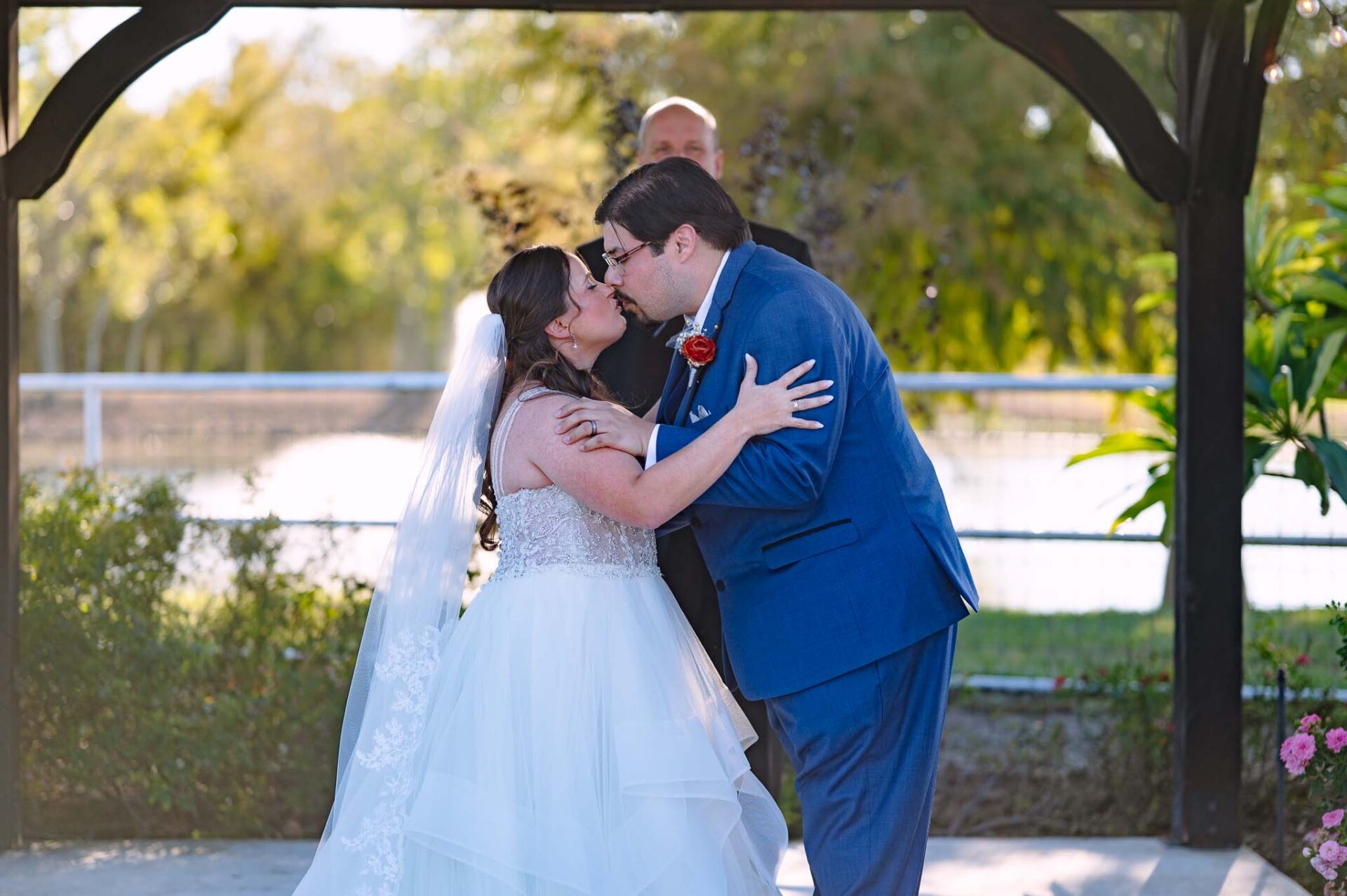 Andreea and Ram share their first kiss beneath the garden gazebo at Circle of Seven Ranch