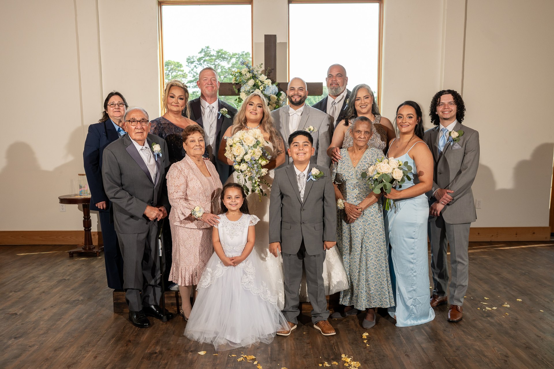 Elijah and Marissa with a large family group in the chapel