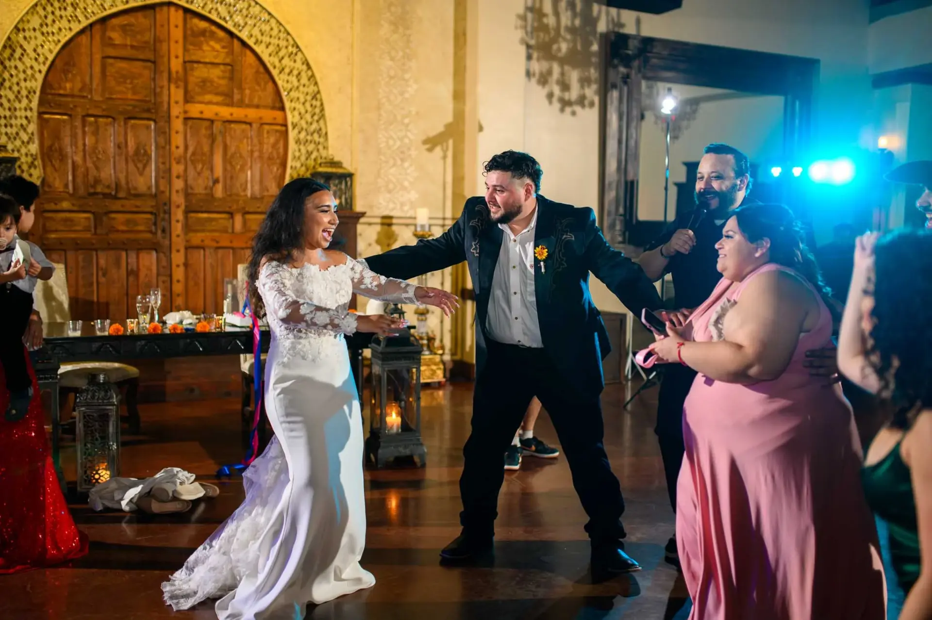 Vanessa and Reymundo dancing with their guests