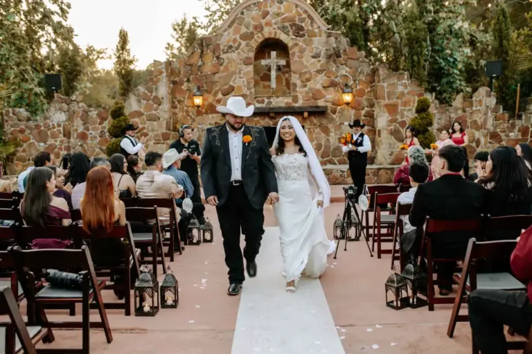 Vanessa and Reymundo walking down the aisle after their outdoor Madera Estates ceremony