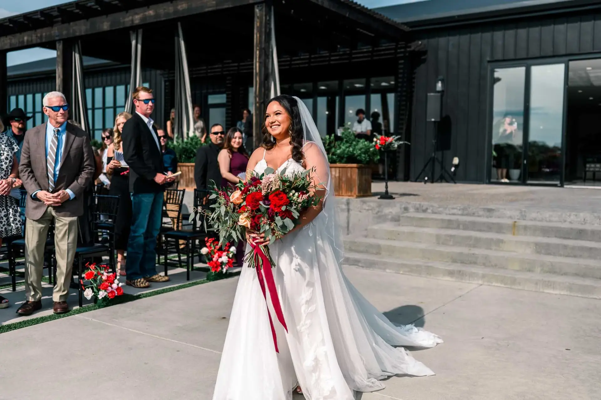 Kyle and Lauren walking back up the aisle after the ceremony